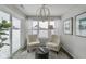 Bright sitting area with lots of natural light and modern chandelier at 19602 Atwater Ave, Sheridan, IN 46069