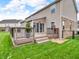 Enjoy outdoor living on this back deck, perfect for entertaining or relaxing while overlooking a well-maintained lawn at 1968 Saratoga Dr, Greenwood, IN 46143