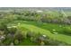 Picturesque golf course with lush fairways, sand traps, and mature trees surrounding property at 1995 W 116Th St, Carmel, IN 46032