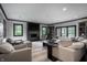 Bright living room featuring comfortable seating, a modern fireplace, and an open layout at 1995 W 116Th St, Carmel, IN 46032