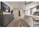 Beautiful primary bedroom featuring gray color scheme, carpet and door to the bathroom at 1995 W 116Th St, Carmel, IN 46032