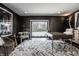 Stylish home office with ample light, patterned rug, and modern decor at 1995 W 116Th St, Carmel, IN 46032