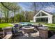 Amazing backyard features a luxurious pool, outdoor firepit, and lounge seating at 1995 W 116Th St, Carmel, IN 46032