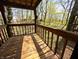 Inviting balcony with beautiful forest views, a perfect place to relax and enjoy nature at 21 Osage Ct, Columbus, IN 47201