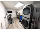 Finished basement featuring a modern washer/dryer and exercise equipment at 21 Osage Ct, Columbus, IN 47201