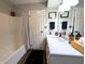 Bathroom featuring a white vanity, mirror, and a shower with curtain at 21 Osage Ct, Columbus, IN 47201