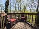 Relax on this private deck with seating and beautiful nature views at 21 Osage Ct, Columbus, IN 47201