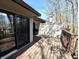 Enjoy nature views from the wooden deck with sliders at 21 Osage Ct, Columbus, IN 47201