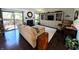 Cozy living room with a fireplace, built-in shelving, and a sliding glass door to the deck at 21 Osage Ct, Columbus, IN 47201