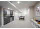 Finished basement featuring a kitchenette and ping pong table for recreation and entertainment at 2261 Mustang Chase Dr, Carmel, IN 46074