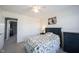 Bedroom featuring carpet, natural light, and a bed with a decorative pillow, plus a view of the hallway at 2261 Mustang Chase Dr, Carmel, IN 46074