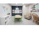 Spacious bonus room with versatile activity areas, including desk and table, for recreation or education at 2261 Mustang Chase Dr, Carmel, IN 46074