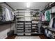 Spacious walk-in closet with multiple storage options and carpet at 2261 Mustang Chase Dr, Carmel, IN 46074