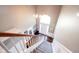 Spacious foyer with large window above front door, stairway and chandelier at 2261 Mustang Chase Dr, Carmel, IN 46074