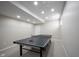 Spacious game room area with a ping pong table and recessed lighting at 2261 Mustang Chase Dr, Carmel, IN 46074