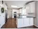 Bright kitchen with white cabinets, stainless steel appliances, and a functional island, ideal for cooking and entertaining at 2261 Mustang Chase Dr, Carmel, IN 46074