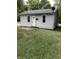 Charming single-story home with a well-maintained lawn and inviting front entrance at 2413 N Macedonia Ave, Muncie, IN 47303