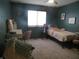 This bedroom has a ceiling fan, window and carpeted floor at 2427 Cedar Bend Dr, Anderson, IN 46011