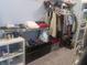 Walk-in closet with built-in shelving and organized clothing racks at 2427 Cedar Bend Dr, Anderson, IN 46011