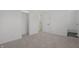 Comfortable bedroom includes closet, entry door, neutral walls, and carpeted floors at 2526 David Dr, Westfield, IN 46074