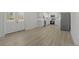 Open kitchen layout with modern stainless steel appliances and white cabinetry at 2526 David Dr, Westfield, IN 46074