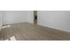 Bright living room with hardwood floors and a brick fireplace at 2526 David Dr, Westfield, IN 46074