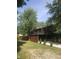 Beautiful home exterior with a deck, featuring a well-manicured lawn and a welcoming driveway at 256 Riverwood Dr, Noblesville, IN 46062