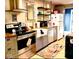 Well-equipped kitchen boasting stainless steel appliances and ample counter space at 256 Riverwood Dr, Noblesville, IN 46062