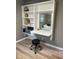 Stylish home office nook featuring built-in shelving and a modern workspace at 256 Riverwood Dr, Noblesville, IN 46062