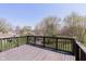 Wooden backyard deck offers a peaceful outdoor space with wooden railing at 2601 Fairhaven Dr, Indianapolis, IN 46229