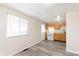 Bright kitchen with modern flooring, white appliances, and wood cabinets at 2601 Fairhaven Dr, Indianapolis, IN 46229