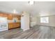 Spacious kitchen featuring modern flooring, white appliances, and wood cabinets at 2601 Fairhaven Dr, Indianapolis, IN 46229