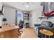 Versatile room features neutral colors, updated light fixtures, and natural light at 272 Van Buren St, Greenfield, IN 46140