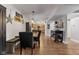 Inviting dining area with hardwood floors, a large wooden table, and decorative wall accents at 272 Van Buren St, Greenfield, IN 46140