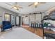 Inviting living area with wood floors, stylish seating, and natural light, perfect for relaxation and gatherings at 272 Van Buren St, Greenfield, IN 46140