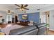 Cozy living room with a flat-screen TV, hardwood floors, and comfortable seating for relaxation at 272 Van Buren St, Greenfield, IN 46140