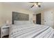 Spacious main bedroom features a large comfortable bed and calming natural colors at 272 Van Buren St, Greenfield, IN 46140