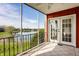 Balcony with railing and screened wall overlooking the lake at 3127 E 52Nd St # C, Indianapolis, IN 46205