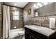 Bathroom with granite countertop and shower at 3127 E 52Nd St # C, Indianapolis, IN 46205