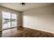 Bedroom with hardwood floors and sliding glass door to the balcony at 3127 E 52Nd St # C, Indianapolis, IN 46205