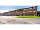 Apartment building with well-maintained facade and ample parking at 3127 E 52Nd St # C, Indianapolis, IN 46205