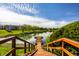 Lake view from the dock stairs with a tranquil water view and community landscaping at 3127 E 52Nd St # C, Indianapolis, IN 46205