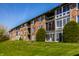 Beautiful exterior view of a brick apartment building with outdoor seating at 3127 E 52Nd St # C, Indianapolis, IN 46205