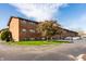 Exterior view of a brick apartment building with mature trees at 3127 E 52Nd St # C, Indianapolis, IN 46205