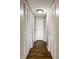 Hallway with hardwood floors and closet space at 3127 E 52Nd St # C, Indianapolis, IN 46205