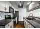 Fully equipped kitchen with stainless steel appliances and granite countertops, great layout with ample lighting at 3127 E 52Nd St # C, Indianapolis, IN 46205