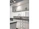 Cozy kitchen featuring ample counter space, white cabinets, and a view to the living area at 3127 E 52Nd St # C, Indianapolis, IN 46205