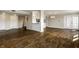 Expansive living room featuring hardwood floors, elegant lighting, and seamless flow, great for gatherings and relaxation at 3127 E 52Nd St # C, Indianapolis, IN 46205