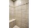 Shower with tile surround and built-in bench at 3127 E 52Nd St # C, Indianapolis, IN 46205