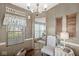 Bright dining room features a modern chandelier and a view to another room at 3283 Westpointe Dr, Franklin, IN 46131